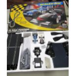 Boxed Scalextric motor racing set, Formula 1 Pole Position with sound control centre