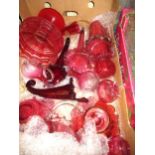 Box containing a quantity of various cranberry glass jugs, dishes, bowls and other glassware