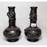 Pair of Japanese bronze, baluster form narrow neck vases, relief decorated with birds and a