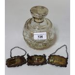 Silver mounted cut glass perfume bottle with hinged cover (lacking stopper), together with a set