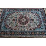 Modern Qum type rug with a medallion and all-over floral design, on ivory ground with pale blue