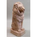 Large painted plaster figure of a seated lion, 107cms high (damages)