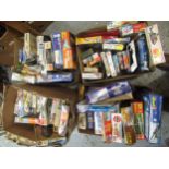 Four boxes containing a large quantity of various unbuilt plastic model aircraft kits, including