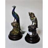 Two Indian white metal figures of birds, mounted on plinth bases