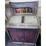 Rock-Ola GP160 juke box, 85cms wide Lights up but does not work. Does contain records