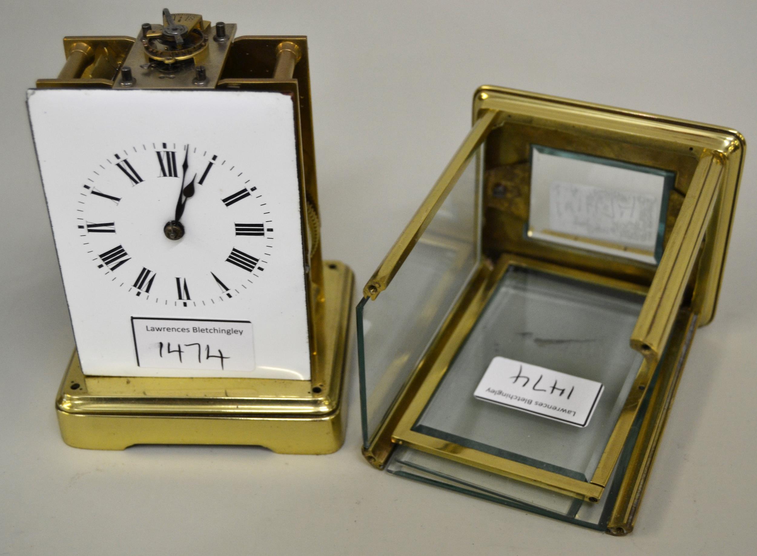 Small brass cased carriage clock, the enamel dial with Roman numerals, signed Barrods Ltd., with a - Image 2 of 2