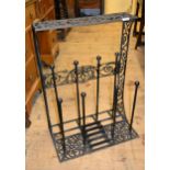 Wrought iron boot stand with integral boot scaper