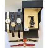 Gentleman's Seiko wristwatch, Victorinox gentleman's wristwatch in original box, a Movado wristwatch