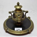 Circular brass mounted wooden inkstand