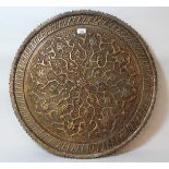 Heavy Indian copper tray with pierced and engraved decoration, together with another Middle