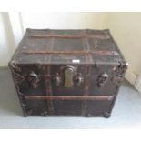 A ' New Atlas ' wooden and iron mounted steamer trunk / chest with original canvas covering. No