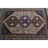 Small modern rug of Southwest Persian design, with a triple hooked medallion and all-over flower