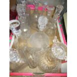 Box containing a collection of twelve various clear and cut glass decanters