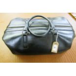 Tanner Krolle, black leather holdall, with key