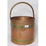 Copper swing handled coal bucket with brass straps, and a copper covered coal box