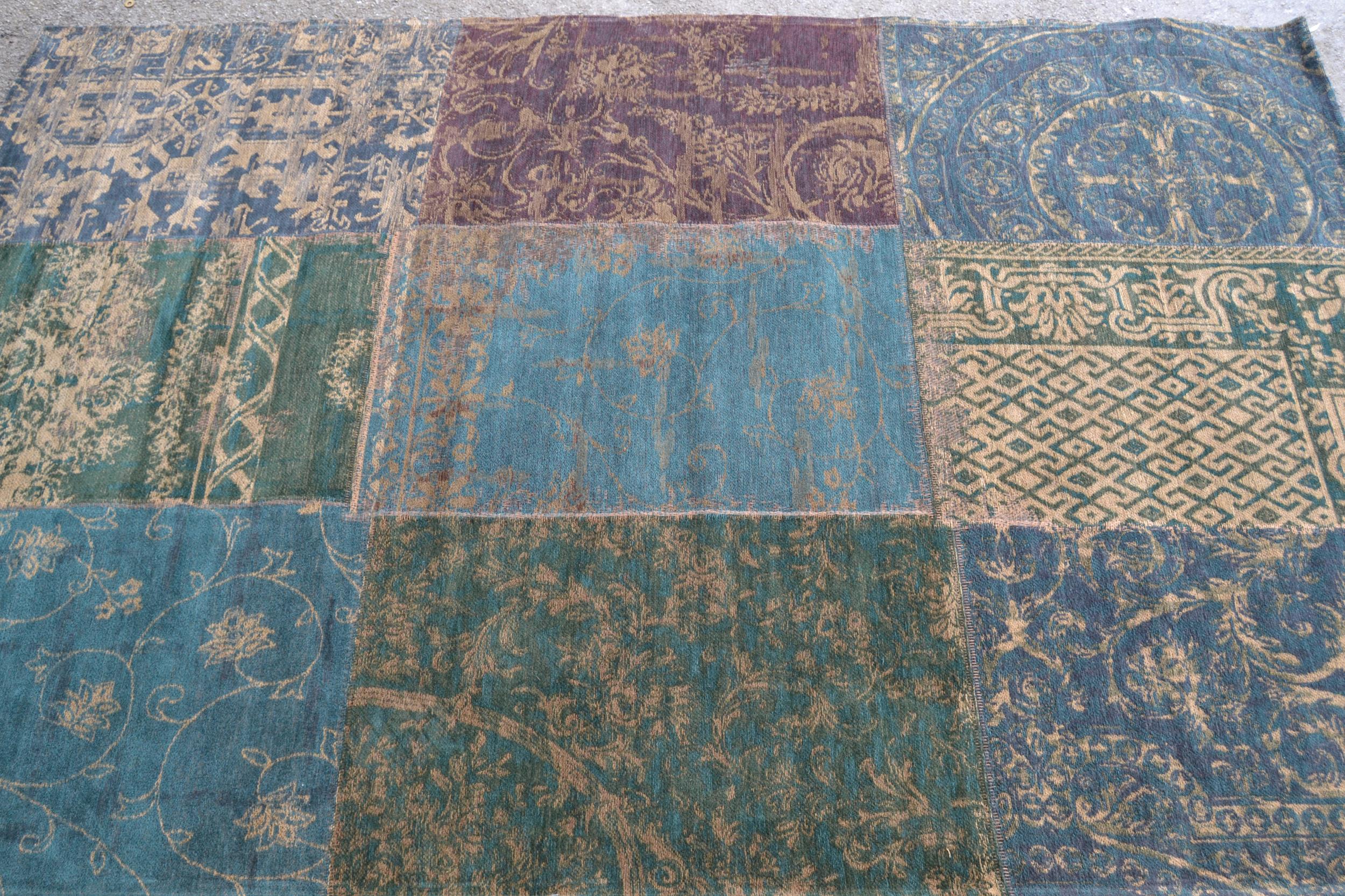 Modern flatweave patchwork rug in shades of dark green and teal, 200cms x 140cms