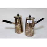 Pair of silver plated hot water and coffee pots, with ebonised handles by Hukin & Heath