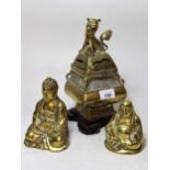 19th Century Chinese bronze censer on a hardwood stand, together with two seated figures of buddha