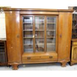 Large early 20th Century Continental walnut side cabinet, the moulded cornice above a centre section