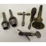 19th Century steel pistol spring clamp, two nipple keys and three other related tools