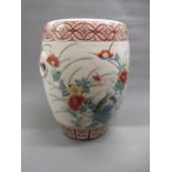 Pair of bird and floral decorated glazed pottery two handled stools, 49cms high x 35cms diameter