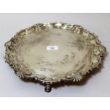 George II silver salver, the shaped moulded shell pattern rim enclosing a plain centre panel, raised