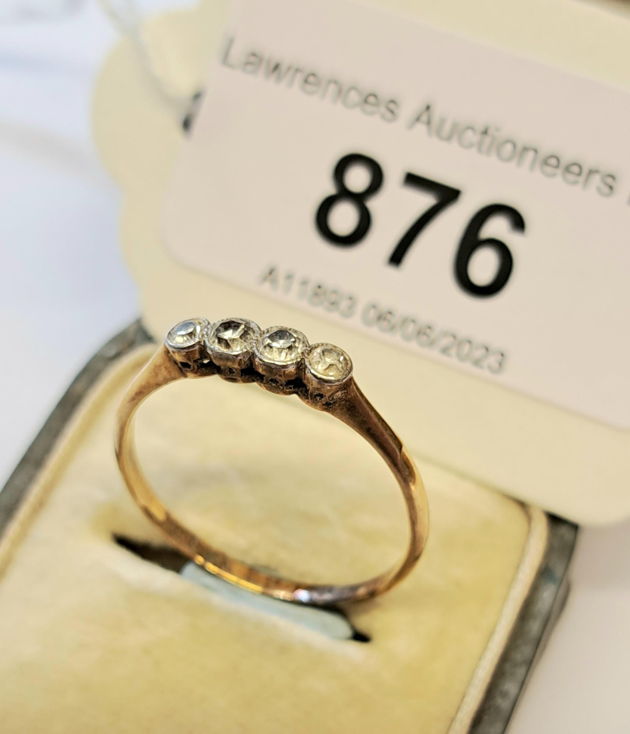 18ct yellow gold four stone diamond ring, size P.5, 1.7g Not chipped but has many inclusions