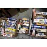 Three boxes containing a large quantity of various unbuilt model aircraft kits including Italeri,