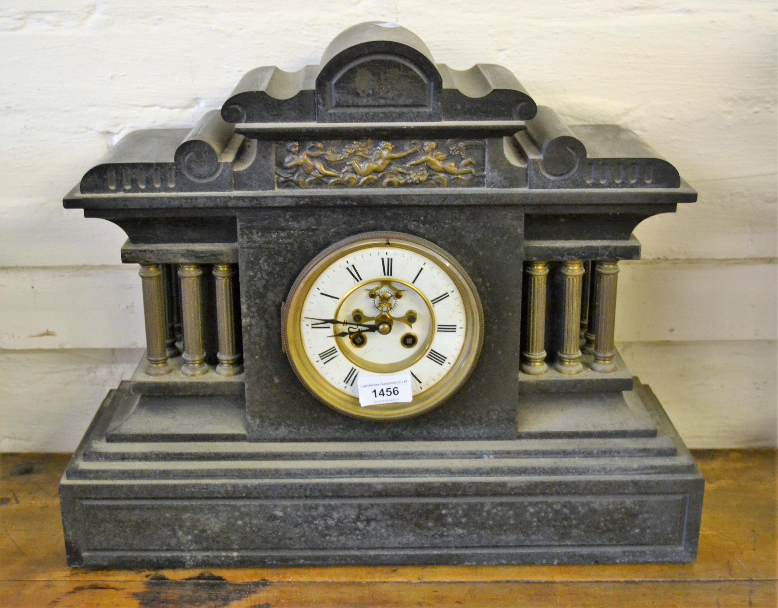 Large 19th Century black slate and brass mounted mantel clock, the enamel dial with Roman numerals