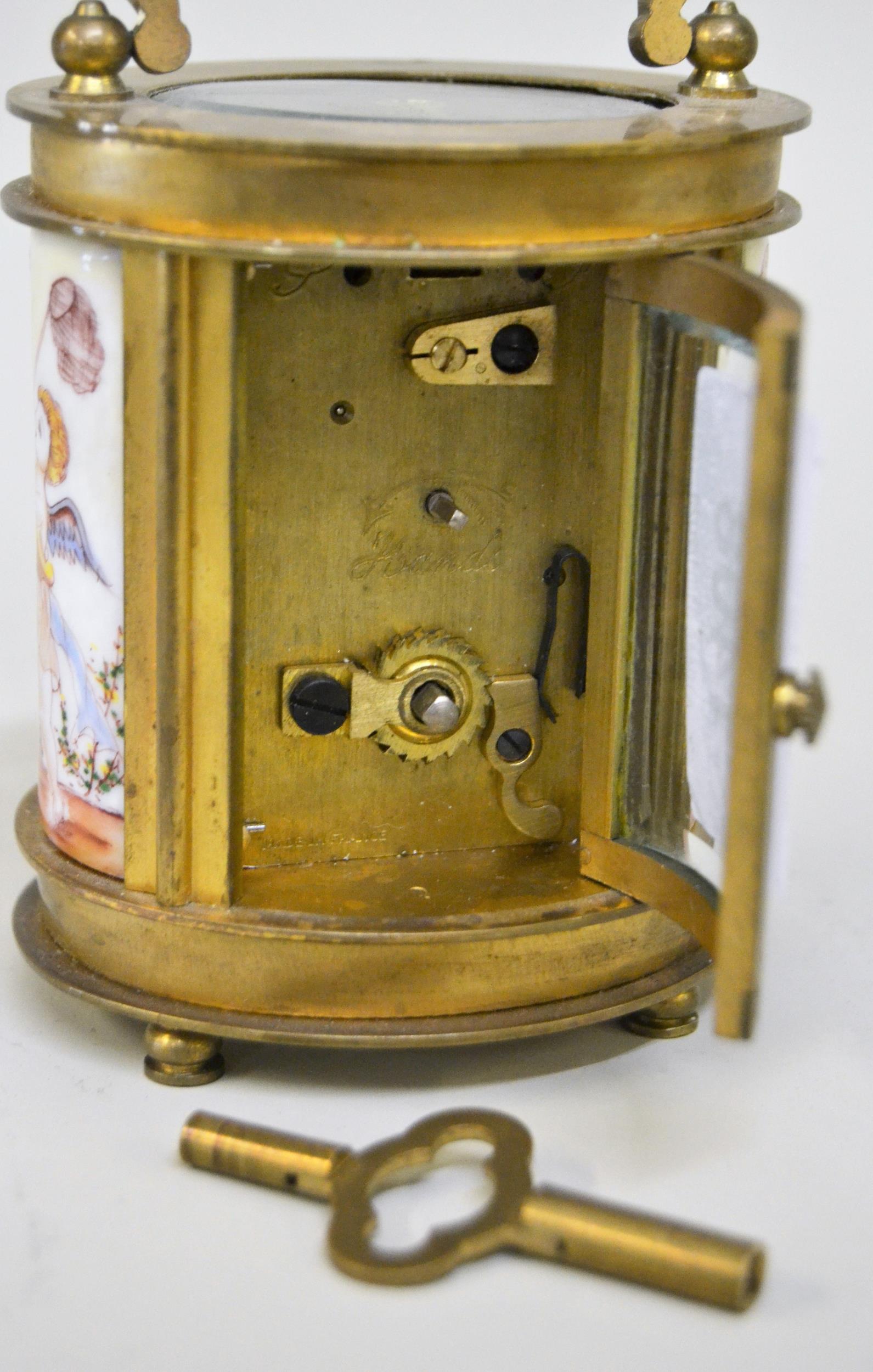 French oval gilt brass and porcelain miniature carriage clock, the dial inscribed Elliott & Sons, - Image 3 of 4