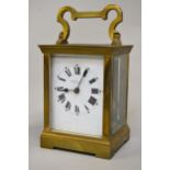 Brass cased carriage clock, the enamel dial with Roman numerals, signed John Little & Company,
