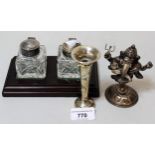 White metal model of Ganesh, 10.5cms high together with a silver specimen vase and a modern inkstand