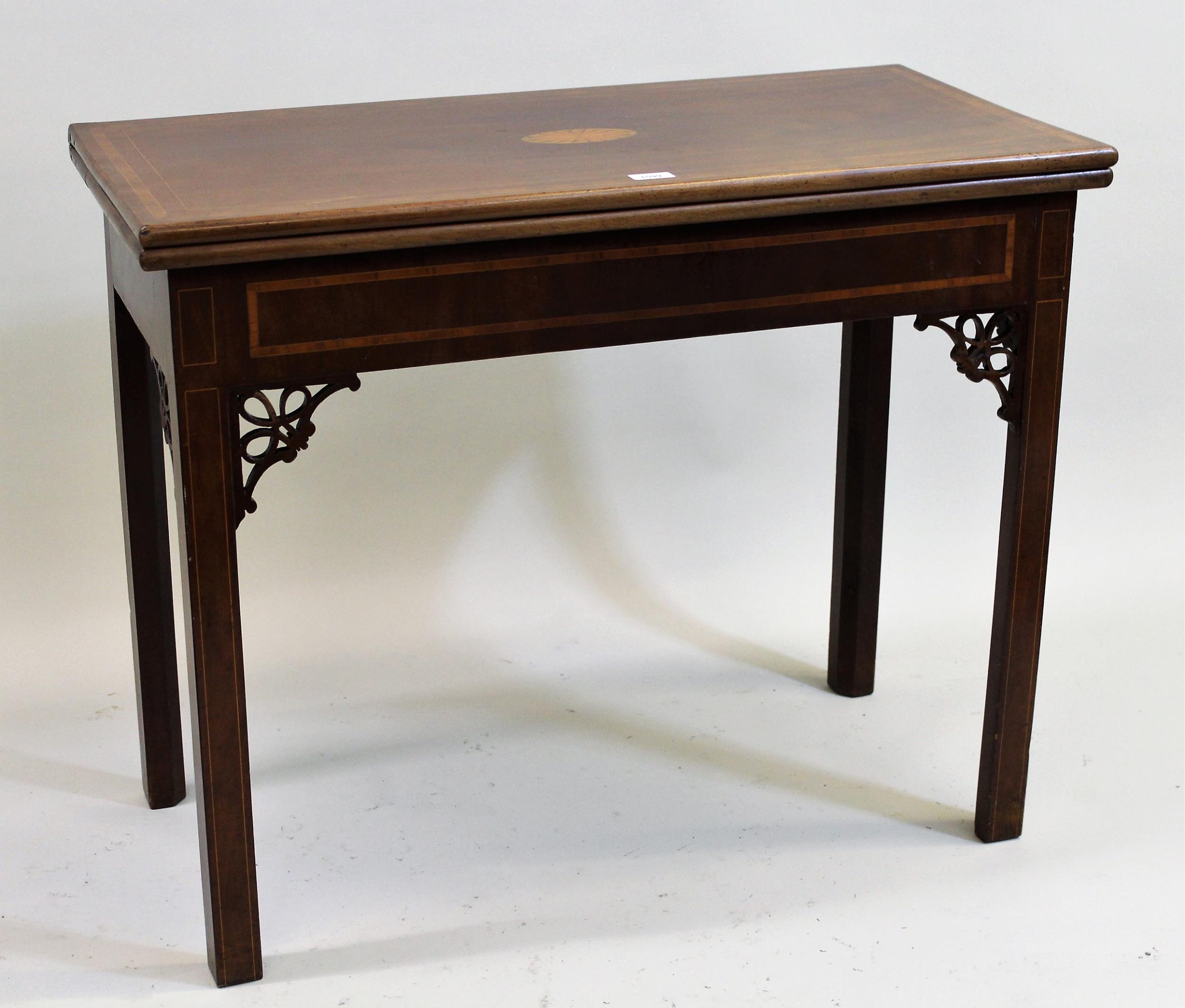 George III rectangular mahogany crossbanded line and lunette inlaid fold-over card table, on