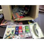 Seven various Scalextric model cars together with a large quantity of various Scalextric accessories