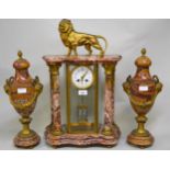 19th Century French pink flecked marble and ormolu mounted portico clock with lion surmount, the