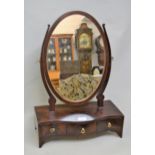 19th Century mahogany oval swing frame dressing mirror, with three drawer serpentine fronted box