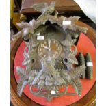 20th Century Black Forest carved cuckoo clock with a two train weight driven movement, 41cms high