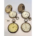 Two silver cased full Hunter pocket watches, together with two silver cased open face pocket watches