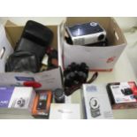 Two boxes containing a large collection of various modern cameras, some in original boxes