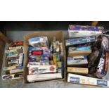 Three boxes containing a large quantity of various unmade plastic model aircraft kits, including
