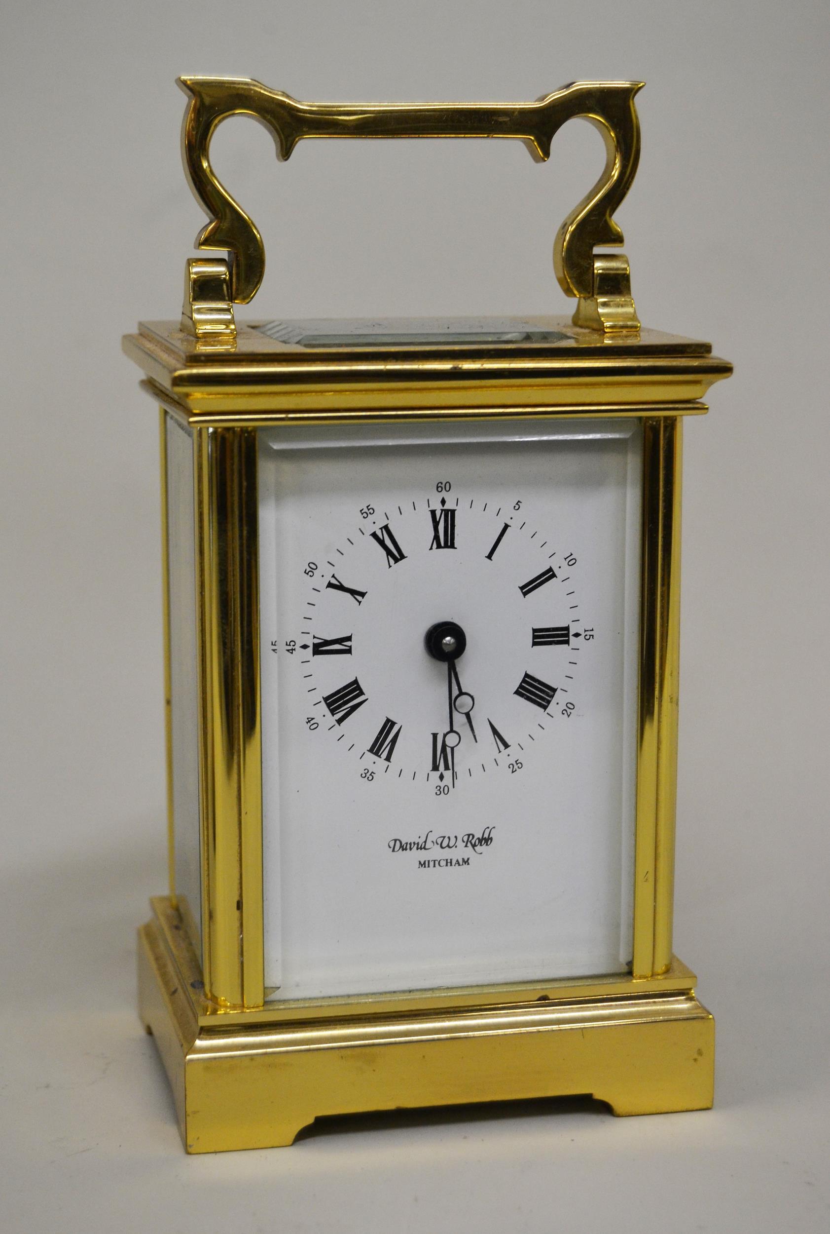 French gilt brass carriage clock, the enamel dial inscribed David W. Robb, Mitcham