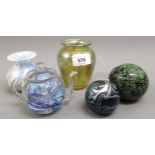 Four small pieces of Isle of Wight and Alum Bay glass including two vases, a paperweight and a