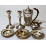 Small silver water pot, silver cream jug, three small dishes and a pair of weighted silver
