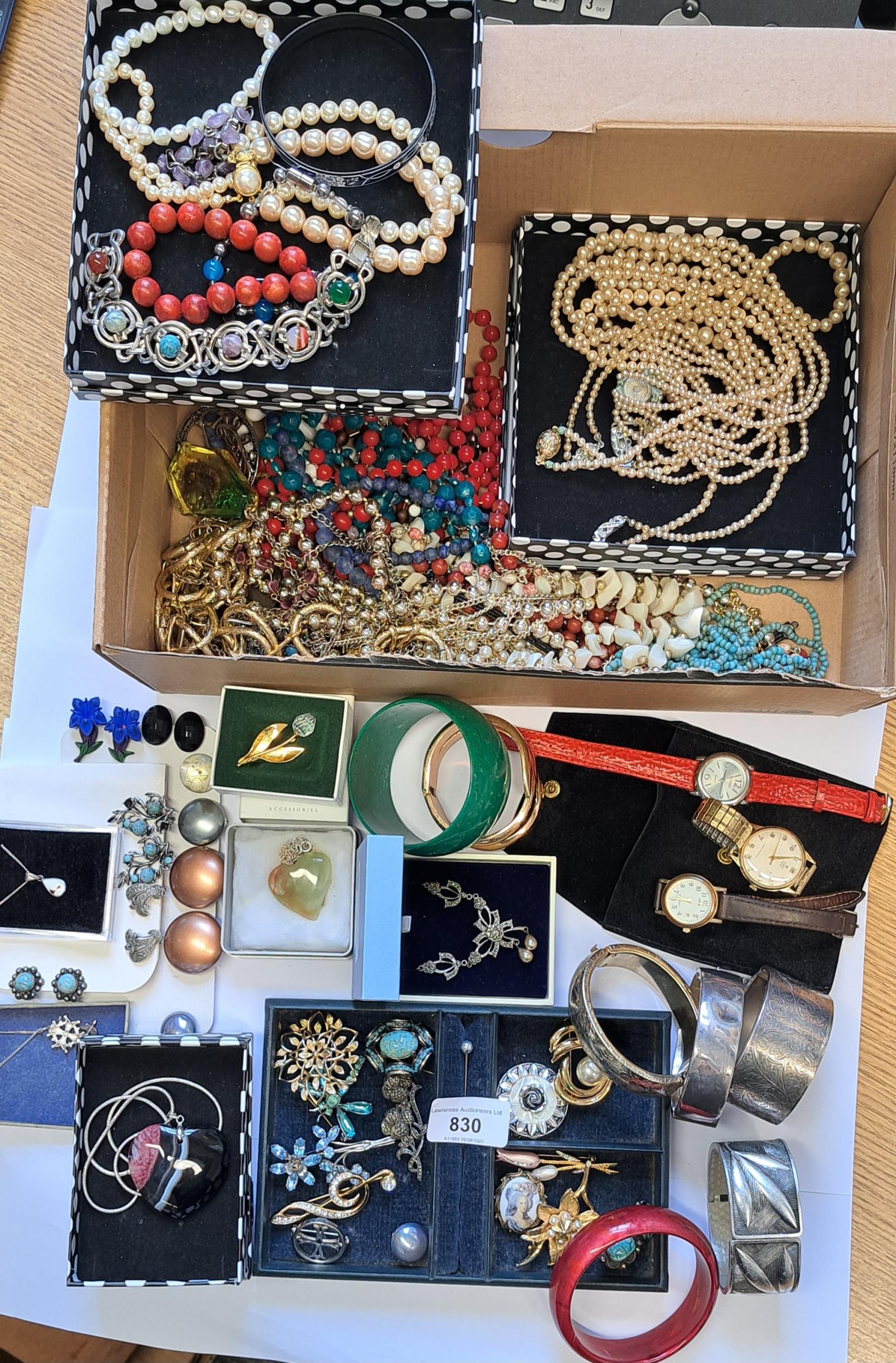 Quantity of miscellaneous costume jewellery including bracelets, brooches etc.