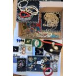 Quantity of miscellaneous costume jewellery including bracelets, brooches etc.