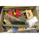 Small wooden case containing a quantity of early Meccano