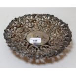Continental white metal embossed and pierced dish on pedestal stand, (lacking centre)
