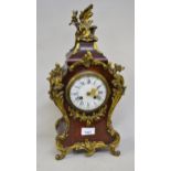 Reproduction French gilt brass mounted stained wooden, two train mantel clock 43cm high