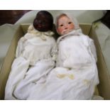 Bisque headed baby doll, with jointed composition body (eyes at fault), together with another bisque