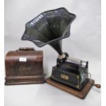 Edison Gem phonograph in an oak case with original horn and a quantity of cylinders, 25cms wide